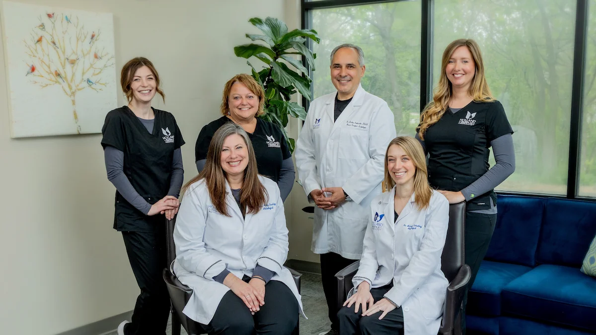 Dr. Stelios Dokianakis, Dr. Michelle Schuiling, and Dr. Mary Lustig at Holland Doctors of Audiology